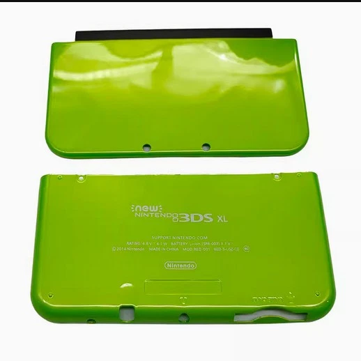 Green Nintendo New 3DS XL console on a white background