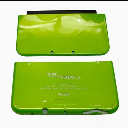 Green Nintendo New 3DS XL console on a white background