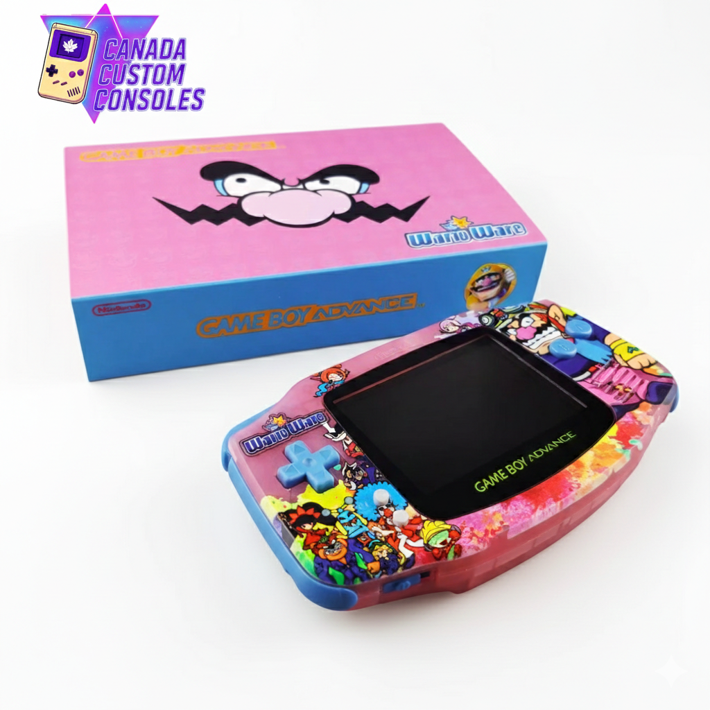 The Game Boy Advance – Wario Edition | IPS 3.0 Laminated Display | Custom Build features vibrant WarioWare-themed art and is displayed before a pink box with Wario’s face and the Canada Custom Consoles logo in the top left corner.