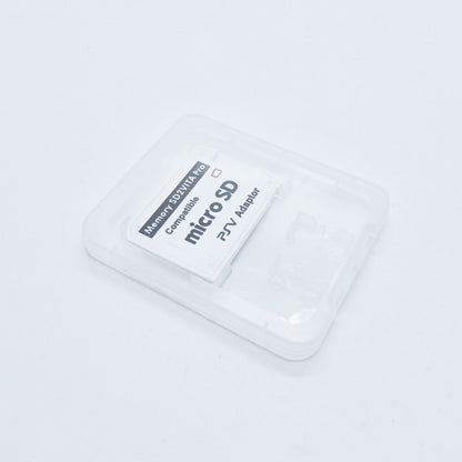 A white plastic case with an SD2Vita 5.0 MicroSD Adapter for PS Vita, labeled Memory SD/TF/ATF Card Compatible micro SD RV Adapter, displayed on a plain white background.